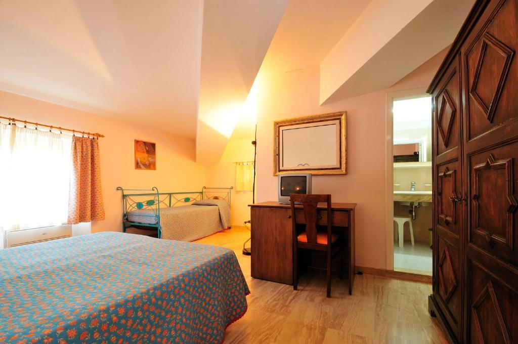 Hotel Villa Campana Cala Liberotto Quarto foto